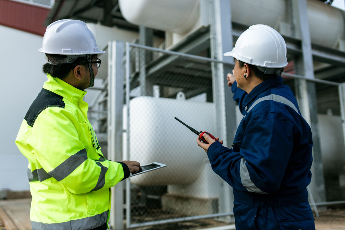 Engineer carrying out Legionella risk assessment Engineer carrying out Legionella risk assessment