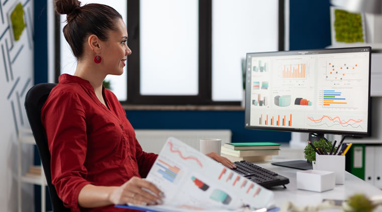 Responsible person reviewing Legionella logbook data