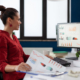Responsible person reviewing Legionella logbook data