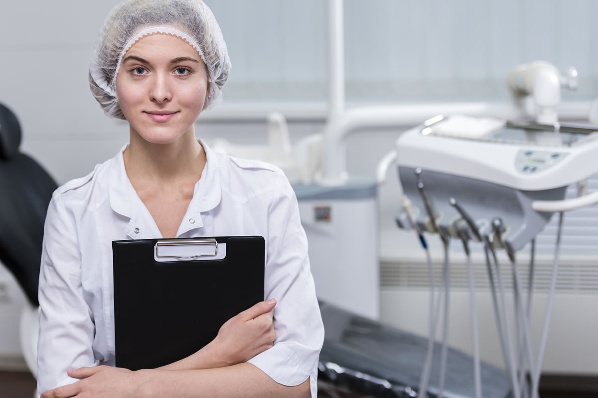 Legionella trained dental practice manager carrying water safety checklist